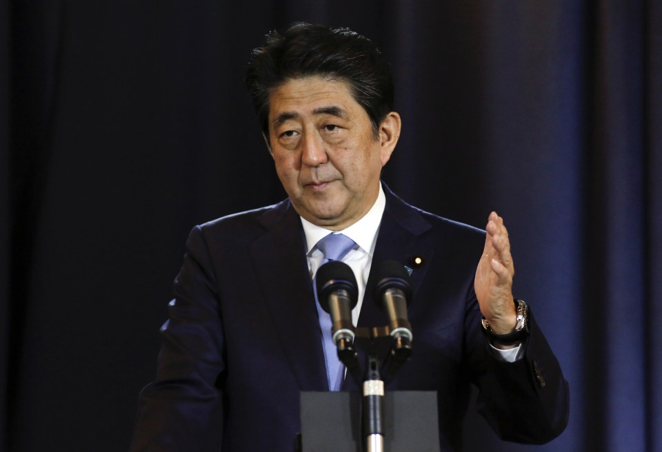 Japanese Prime Minister Shinzo Abe talks during a press conference in Buenos Aires, Argentina, Monday, Nov. 21, 2016. Abe met with Argentina's president on Monday as part of an official visit to boost trade ties between the two countries. (AP Photo/Luciano Matteazzi)