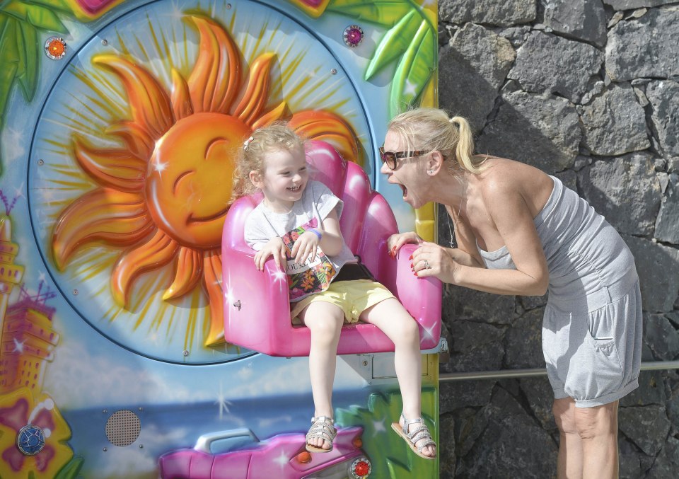  She pulled funny faces to entertain her two-year-old