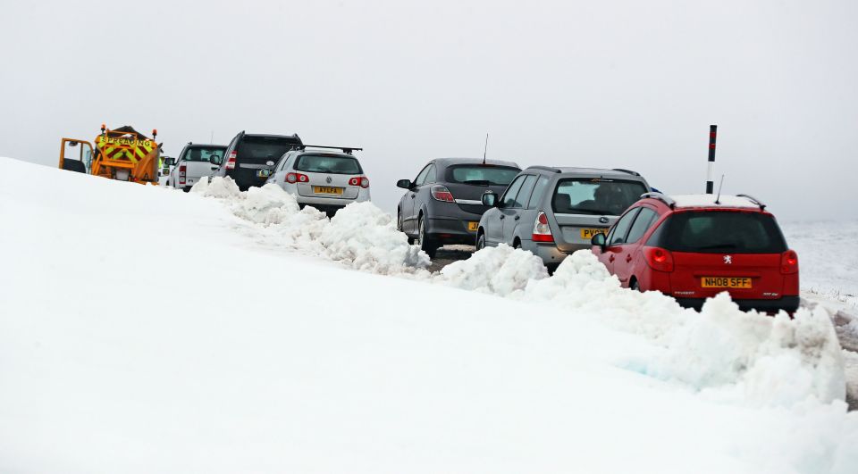 A snow plough clears teh way for traffc on the B6277 between Alston and Teesdsale