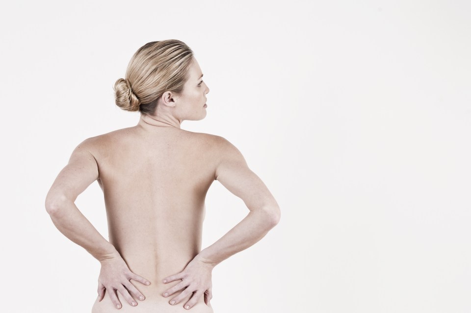 Another sign a woman may be suffering ovarian cancer, that has spread, is back pain