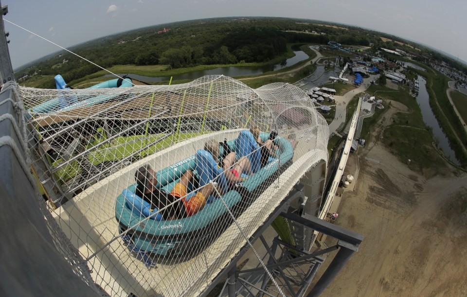 Riders were strapped into three-person rafts with nylon harnesses