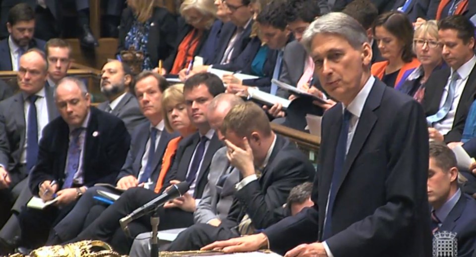  MPs listen to the latest economic announcements. One looks either tired or upset