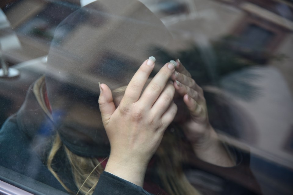  Embassy covered her face as she arrived at the Swedish embassy today