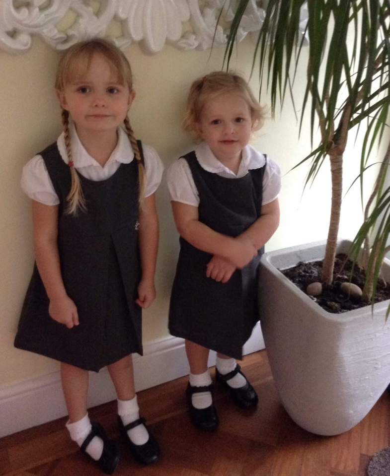 Lilly, right, attends mainstream school with Molly, where she has one-to-one care from a teacher to help her catch up