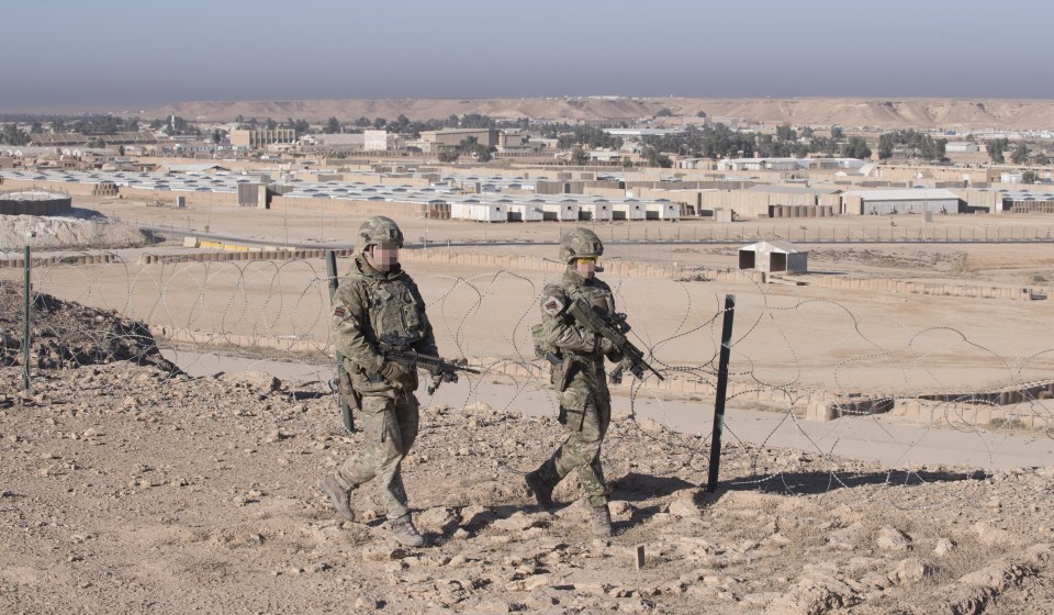  Armed Forces patrol the perimeter of Camp Havoc