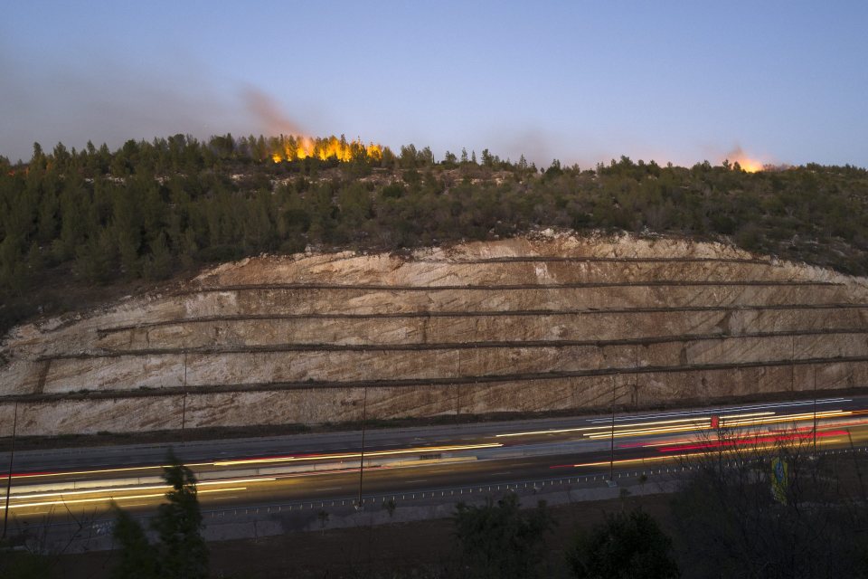  Police say the first fire started early on Tuesday morning in a village jointly founded by Israeli Jews and Arabs