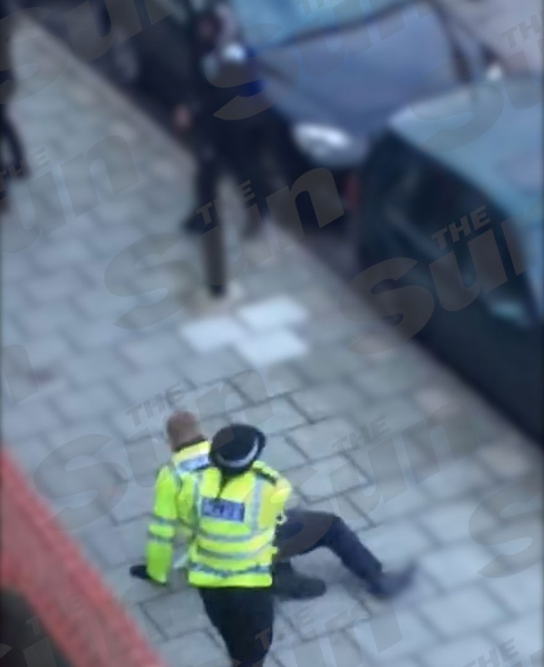  Targets... officer trying to help her injured colleague