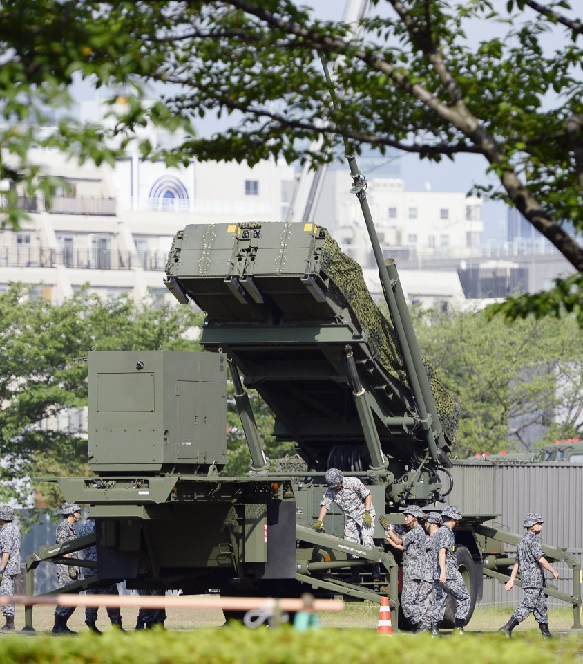  Japanese Air Self-Defence Force members set up Patriot Advanced Capability-3 surface-to-air guided interceptors in Tokyo