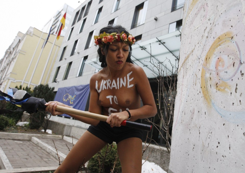  The woman had "Ukraine to EU" written on her chest