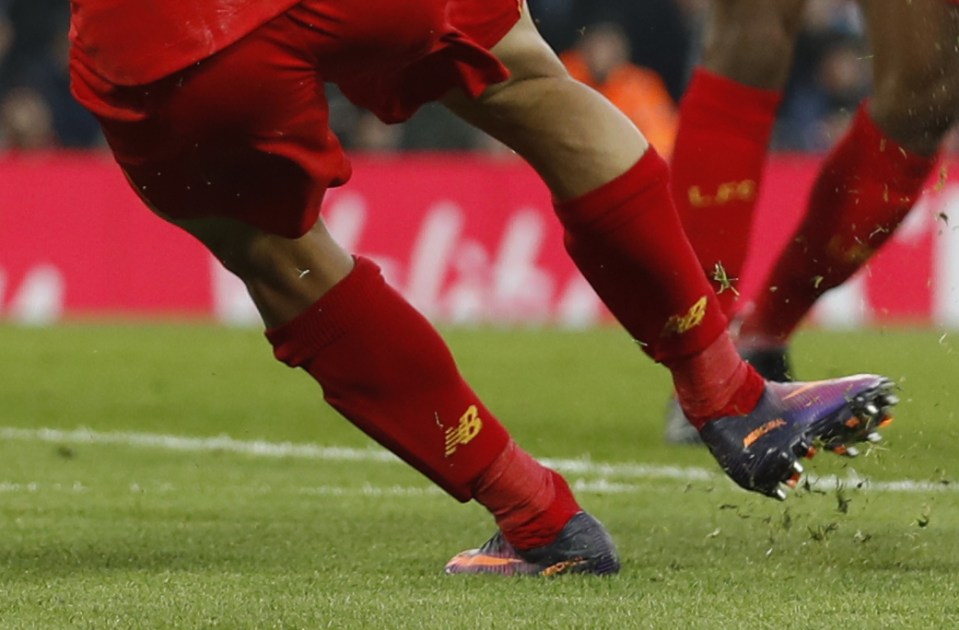  Philippe Coutinho's ankle is left hanging in a horrible position after he suffered an injury in the Liverpool clash with Sunderland