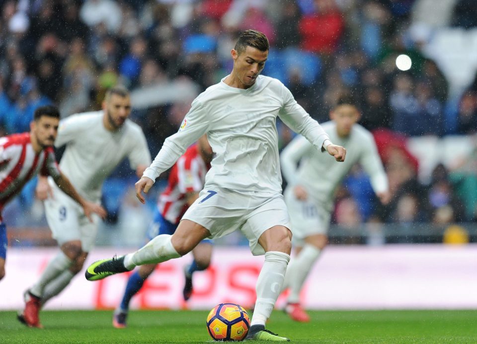 Cristiano Ronaldo sports the new kit as he takes a 5th minute penalty