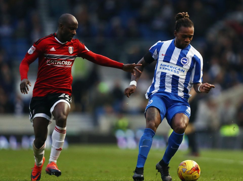  Sone Aluko of Fulham challenges Gaetan Bong of Brighton