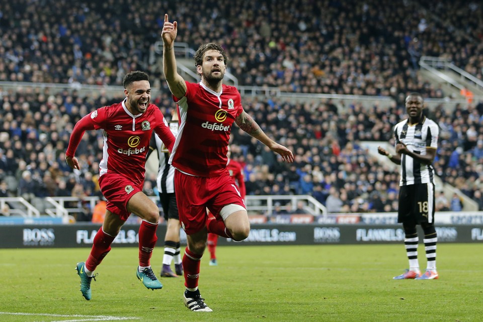 Charlie Mulgrew of Blackburn Rovers celebrates scoring his team's winning goal 