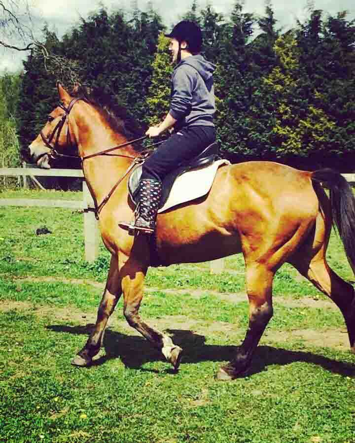 Kelsey before the accident riding a horse