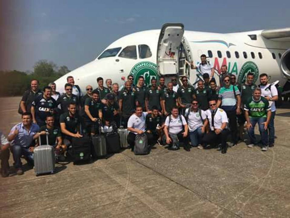 Tragic photograph shows team huddled outside doomed plane before they board