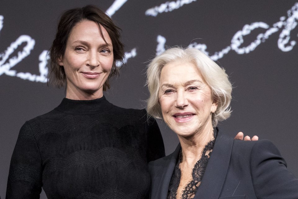  Uma posed for a shot with Helen Mirren at the big reveal in Paris