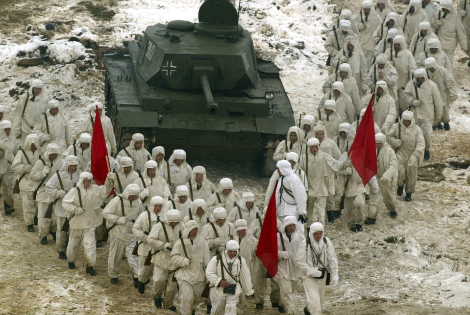 The myth states 28 Red Army soldiers destroyed 18 tanks during the Battle of Moscow (seen here being recreated in 2004)