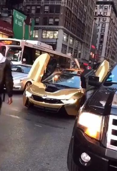 A driver smashed a YouTube prankster’s £100,000 supercar with a baseball bat after he held up traffic in New York