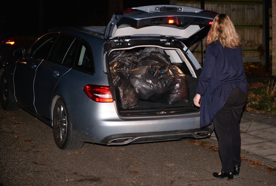 Detectives filled a car with evidence bags from Bennell's home today 