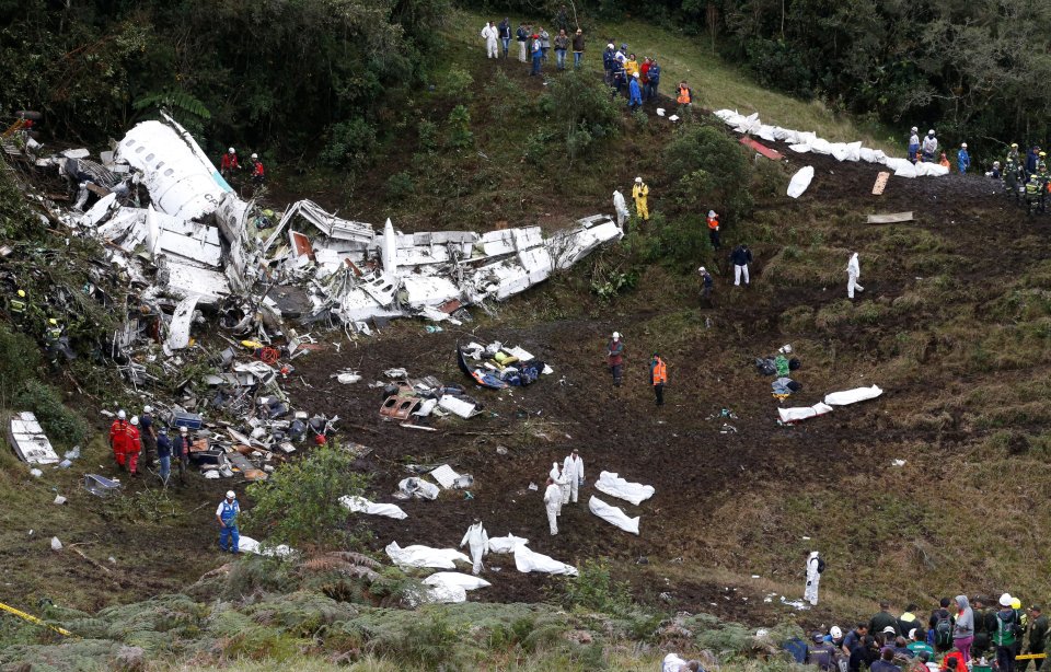 Rescue workers at the site of the crash, about 30km south of Medellin