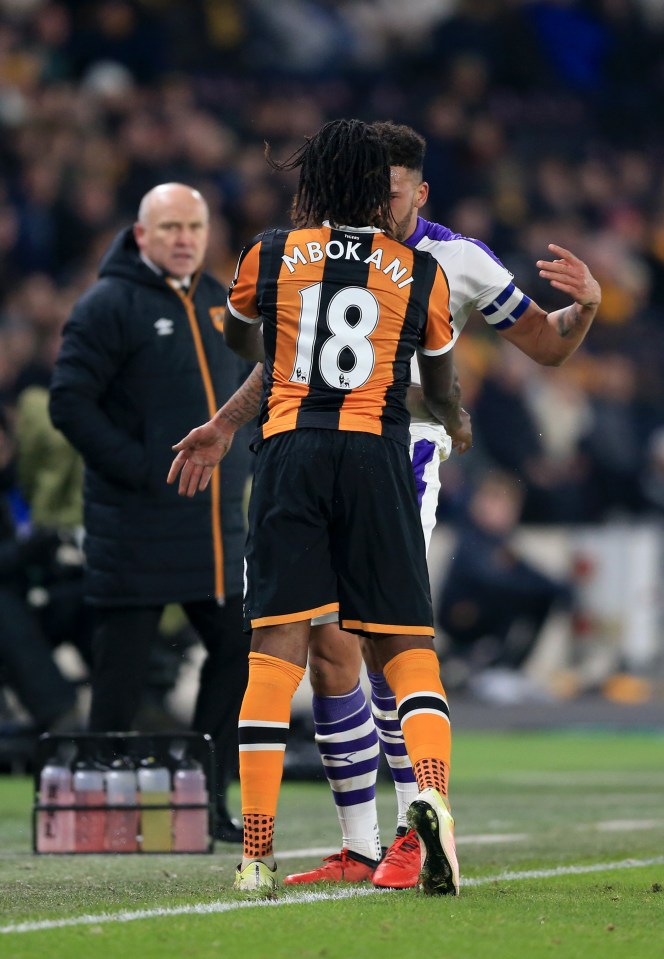 Hull City's Dieumerci Mbokani clashed with Newcastle United's Jamaal Lascelles in the 88th minute