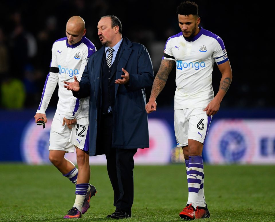 Newcastle boss Rafa Benitez is in deep discussion with one of the men who missed his penalty, Jonjo Shelvey, and captain Jamaal Lascelles after they were dumped out