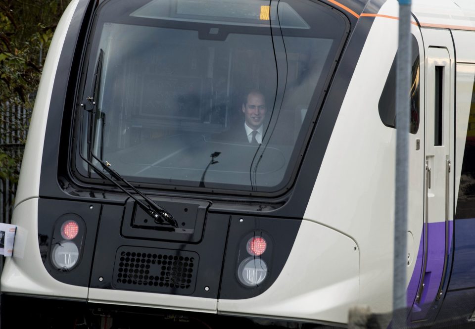  Prince William beamed with joy while he was given the task of taking the train for a spin on the test track