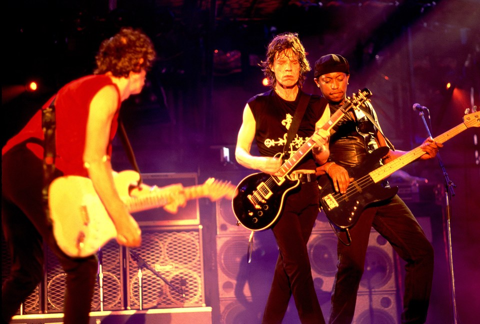  Keith Richards and Mick Jagger of The Rolling Stones perform alongside Darryl Jones