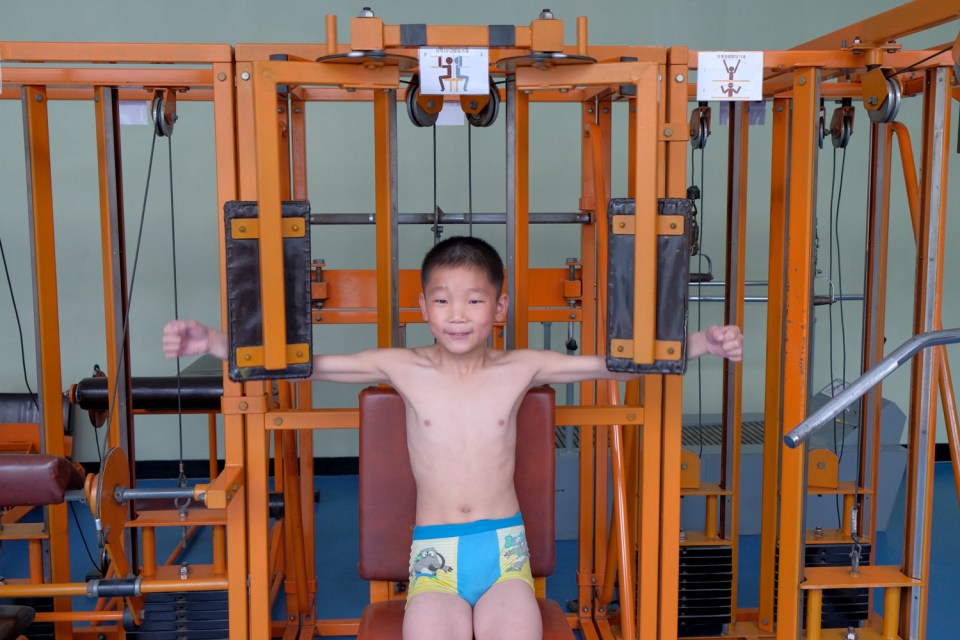  A child works out at a Pyongyang health complex