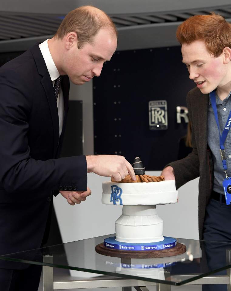  Andrew Smyth, right, spent eight hours creating cake masterpiece ... Prince William admitted he couldn't tell if it was edible