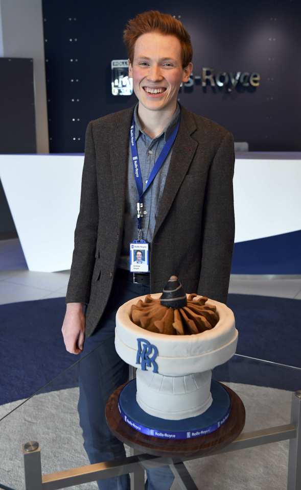  Beaming ... Andrew posed with the cake he made for Prince William, which he says turned out to be 'a bit of a showpiece'