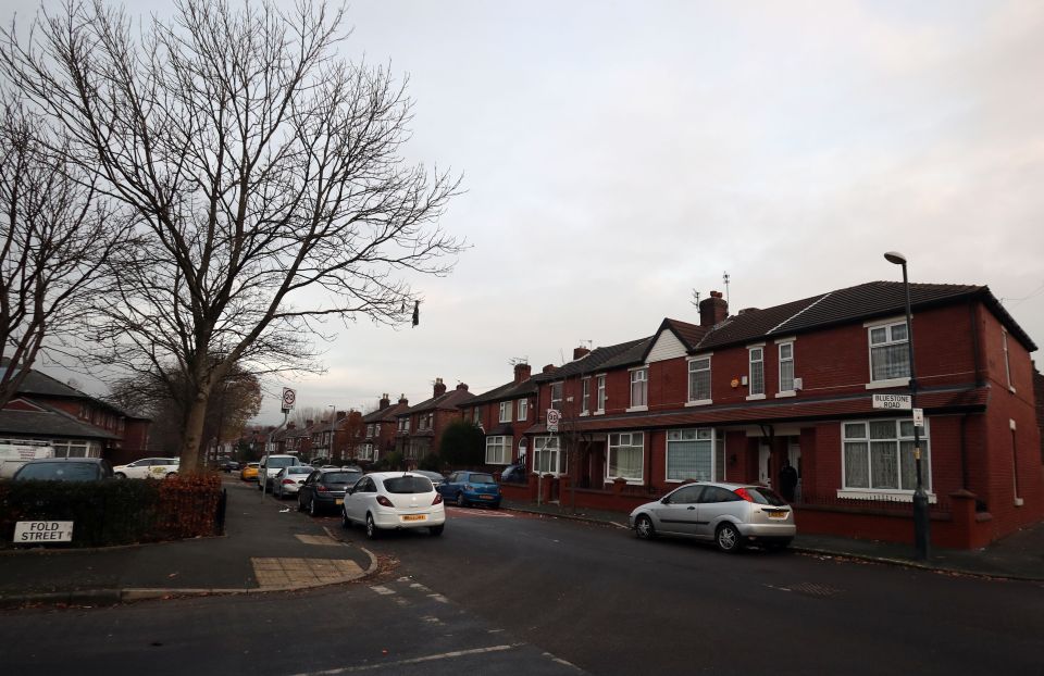  Cops were called to a house on Bluestone Road in Moston, Manchester where a dog had attacked four people