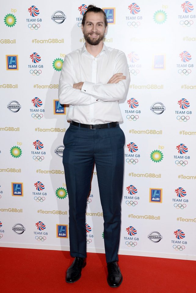 Rower Paul Bennett standing on the carpet