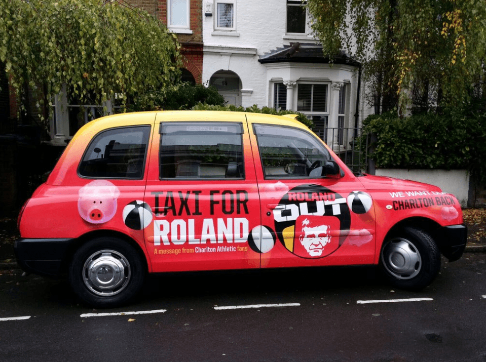 The black cab that has been adorned with anti-Roland Duchatelet slogans