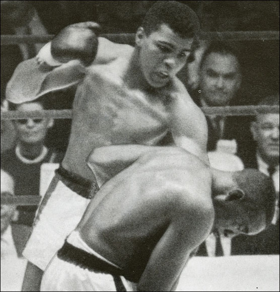  Muhammad Ali, then Cassius Clay, lands another blow on Sonny Liston as he wins the world heavyweight championship in 1964