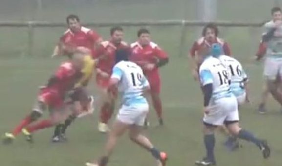 Vicenza player Bruno Andres Doglioli charges into ref Maria Beatrice Benvenuti in the clash against Valsugana