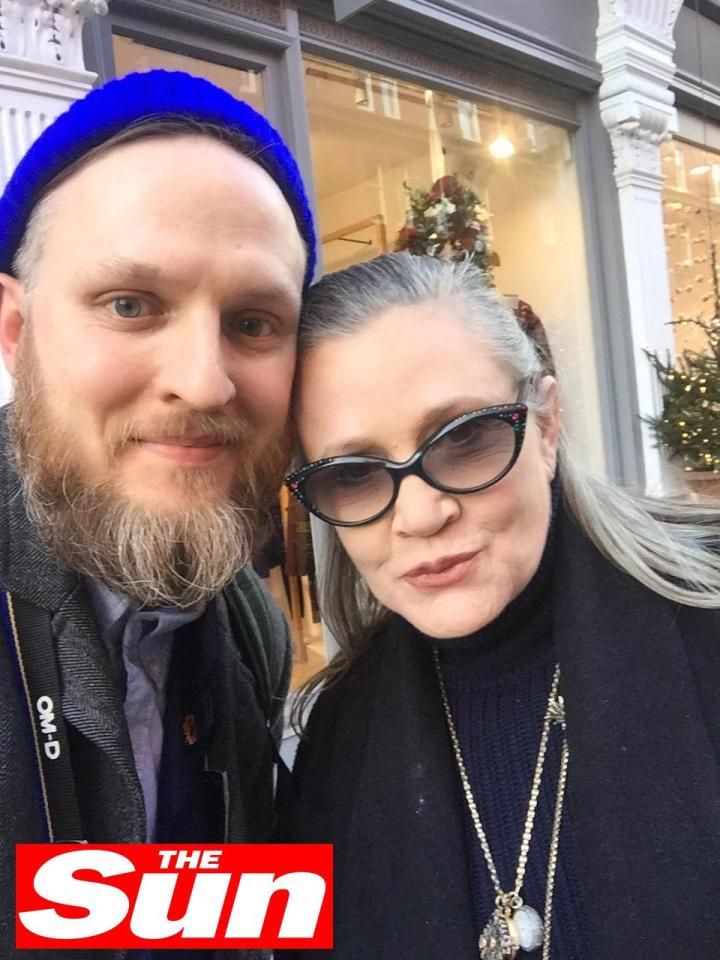  Carrie Fisher was last pictured in London with fan Jonny Kennedy just one day before suffering a heart attack on a plane