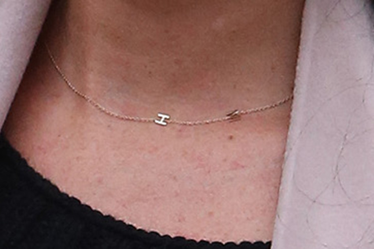  If you look closer, you can see the delicate M and H on the necklace