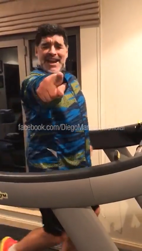  Diego Maradona addresses the camera as he dances on the rolling treadmill