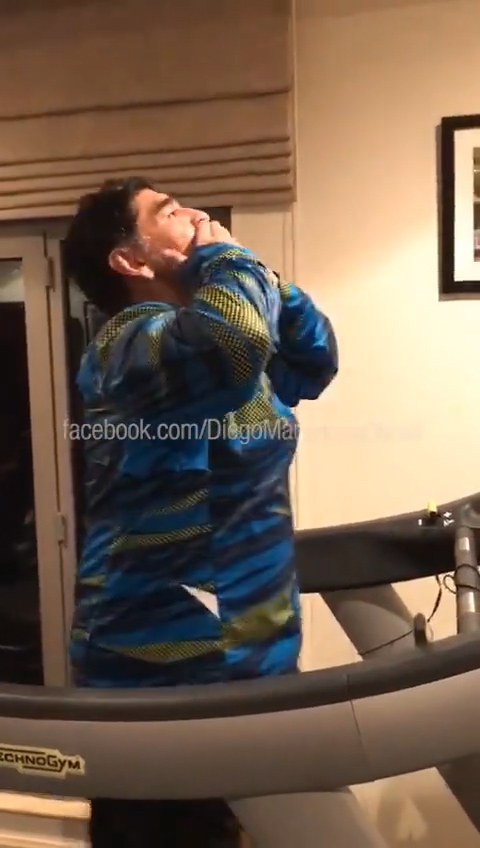  Maradona kisses both hands as he passionately dances to the song "Perra"