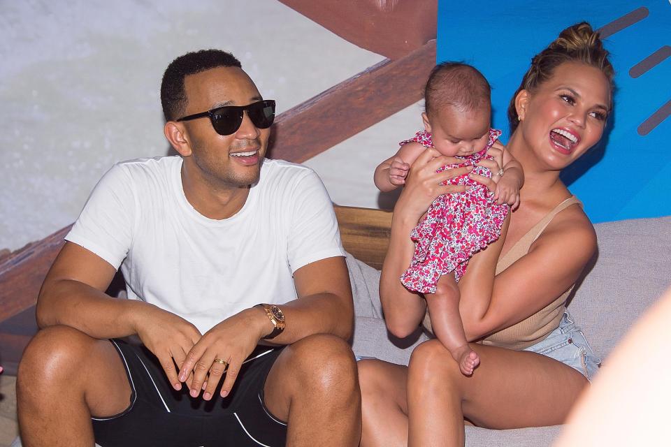 Chrissy Teigen and John Legend with their baby Luna Simone Stephens 