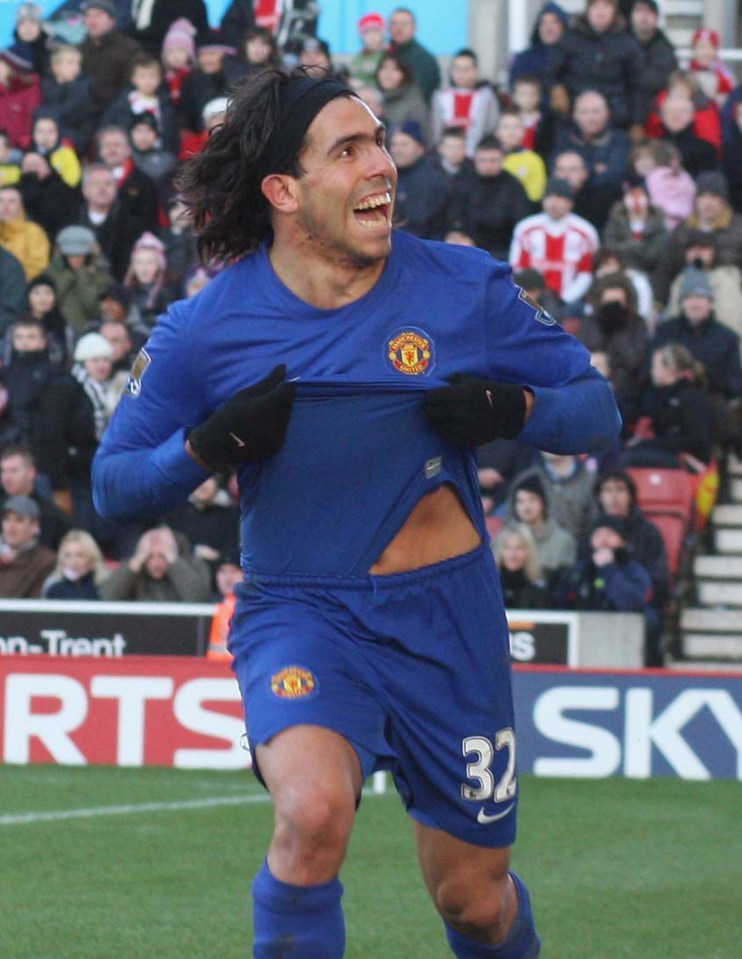 STOKE, ENGLAND - DECEMBER 26: Carlos Tevez of Manchester United celebrates scoring their first goal during the Barclays Premier League match between Stoke City and Manchester United at the Britannia Stadium on December 26 2008 in Stoke, England. (Photo by John Peters/Manchester United via Getty Images)