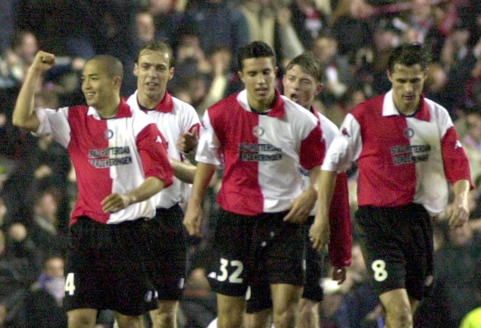  Van Persie (centre) playing for Feyenoord in 2002