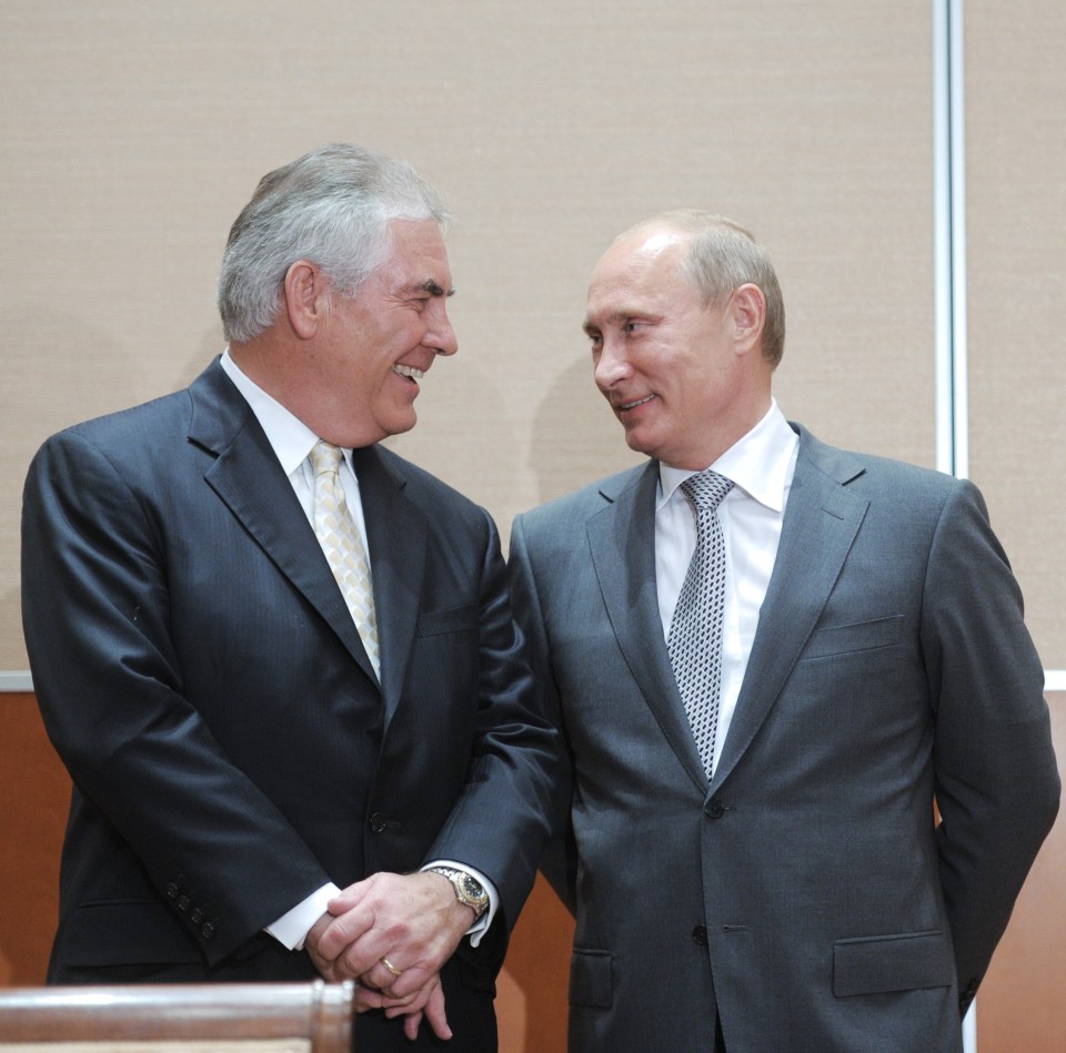  Tillerson, left, and Vladimir Putin share a laugh during the signing of a Rosneft-ExxonMobil deal in August 2011