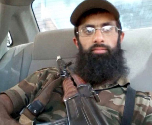  Supermarket jihadi . . . Omar Hussain poses with rifle