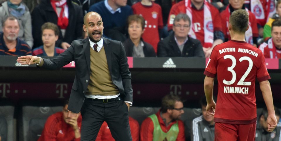 epa05015697 Munich's head coach Pep Guardiola (front L) and his player Joshua Kimmich during the German Bundesliga soccer match between Bayern Munich and VfB Stuttgart in Munich, Germany, 07 November 2015. EPA/ PETER KNEFFEL (EMBARGO CONDITIONS - ATTENTION - Due to the accreditation guidelines, the DFL only permits the publication and utilisation of up to 15 pictures per match on the internet and in online media during the match)