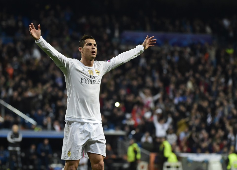 Real Madrid's Portuguese forward Cristiano Ronaldo celebrates after scoring during the UEFA Champions League Group A football match Real Madrid CF vs Malmo FF at the Santiago Bernabeu stadium in Madrid on December 8, 2015. AFP PHOTO/ PIERRE-PHILIPPE MARCOUPIERRE-PHILIPPE MARCOU/AFP/Getty Images