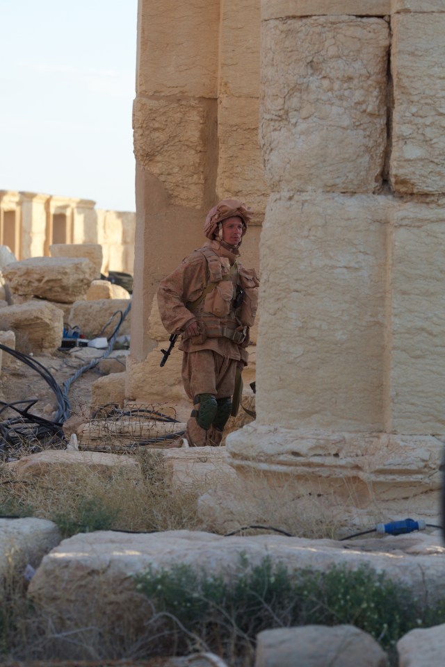  A Russian soldier caught on camera amid the ruins of Palmyra in April