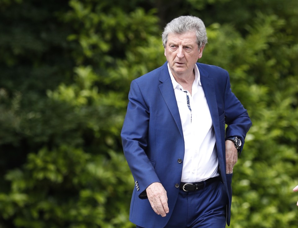 Roy Hodgson makes his way to a press conference when he was in charge of England 