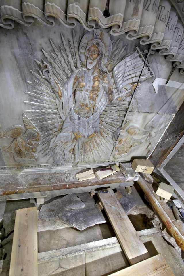 A picture shows the Tomb of Jesus, where